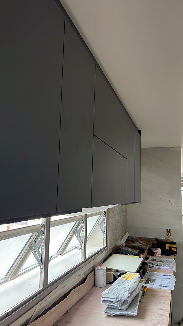 Matte black upper cabinets